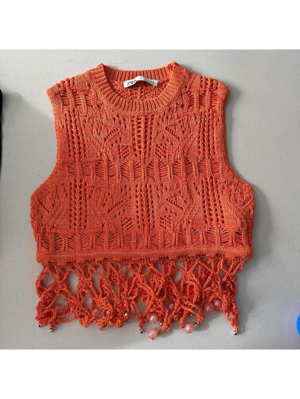 Zara Orange crochet crop top with beading at the bottom for detail.